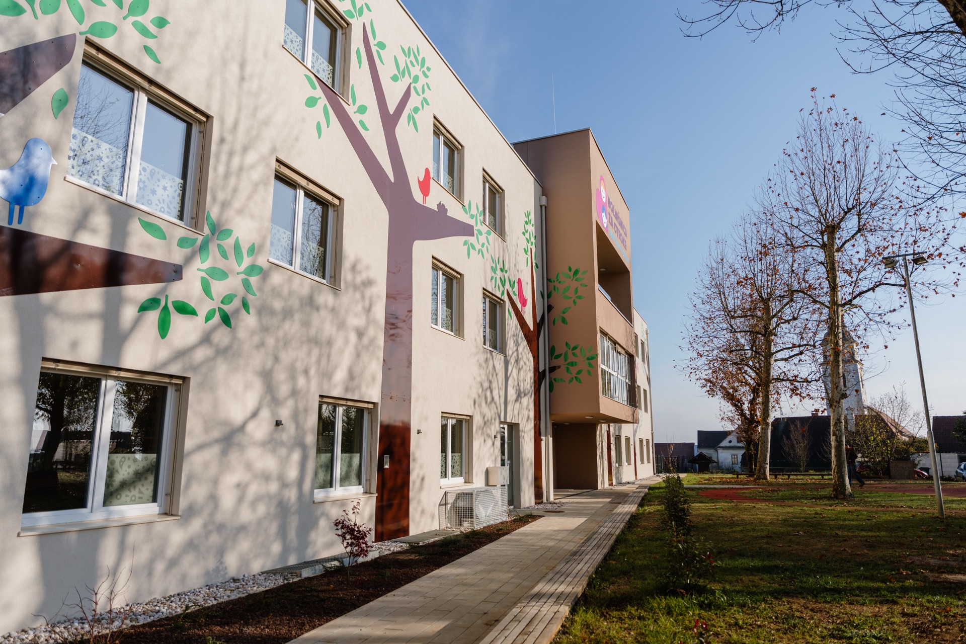 The garden facade with its painted-tree murals