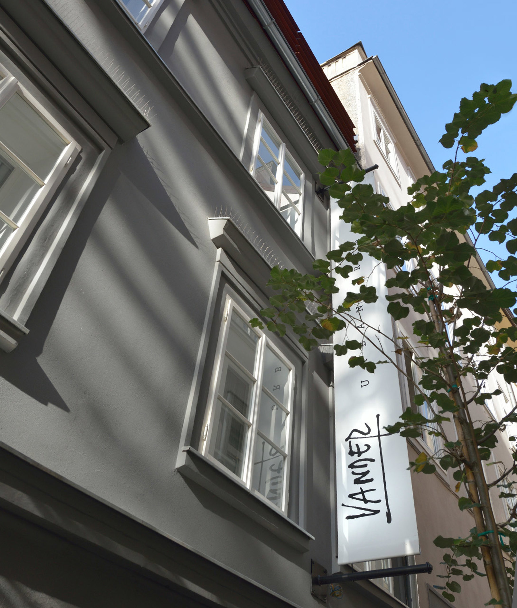 The hand-lettered Vander sign on the facade